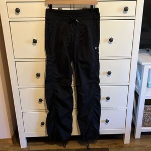 Lululemon dance studio pants, straight leg, cinched at the bottom in pics